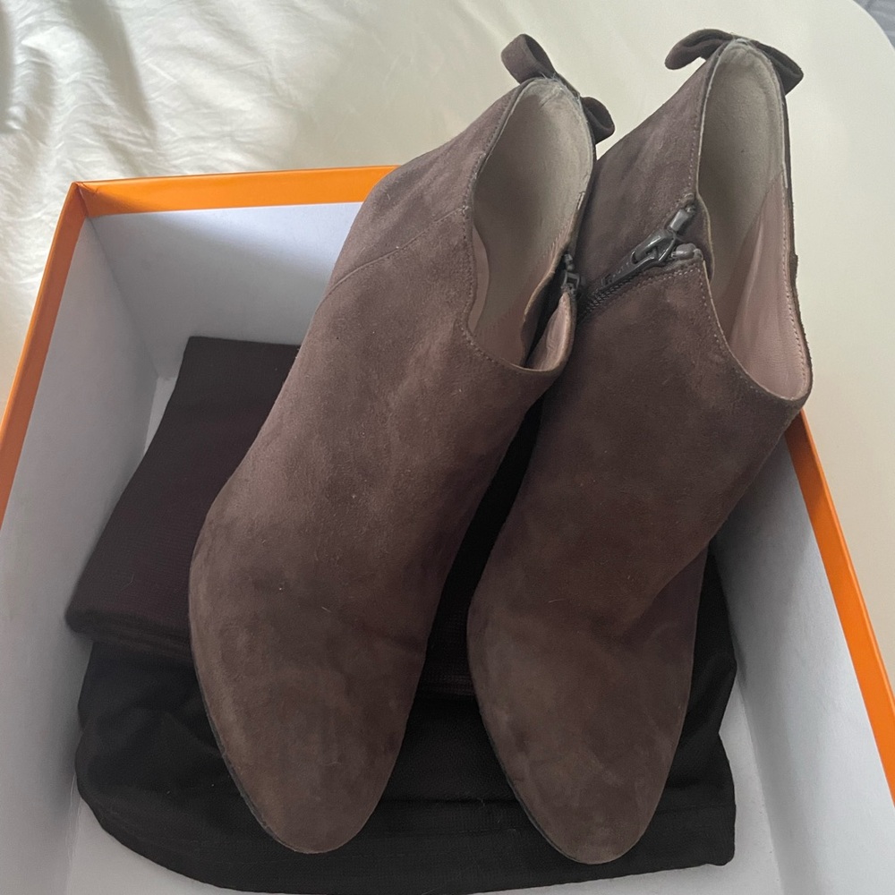 Kate Spade taupe suede heeled booties.